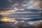 USA, New Jersey, Cape May National Seashore. Stormy sunset on ocean beach. Art Print